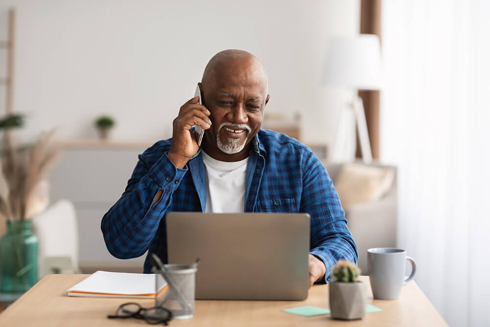 Talking on the phone and smiling, a man looks down at his laptop. Medicaid and different parts of Medicare apply differently to your situation depending on the type of disability benefits you receive.